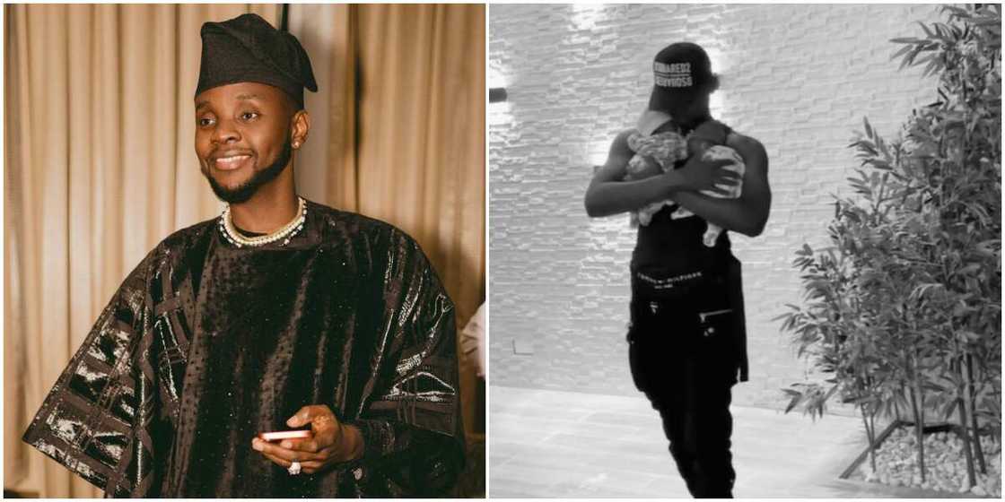 Baba Ibeji: Singer Kizz Daniel Shares First Video of His Twin Boys, Cuddles Them in His Warm Embrace Baba Ibeji: Singer Kizz Daniel Shares First Video of His Twin Boys, Cuddles Them in His Warm Embrace