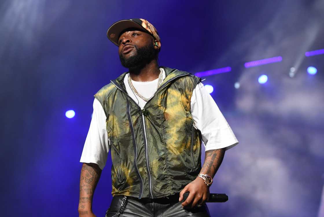 Recording artist Davido performs onstage during the Davido & Friends Birthday Concert at State Farm Arena Recording artist Davido performs onstage during the Davido & Friends Birthday Concert at State Farm Arena