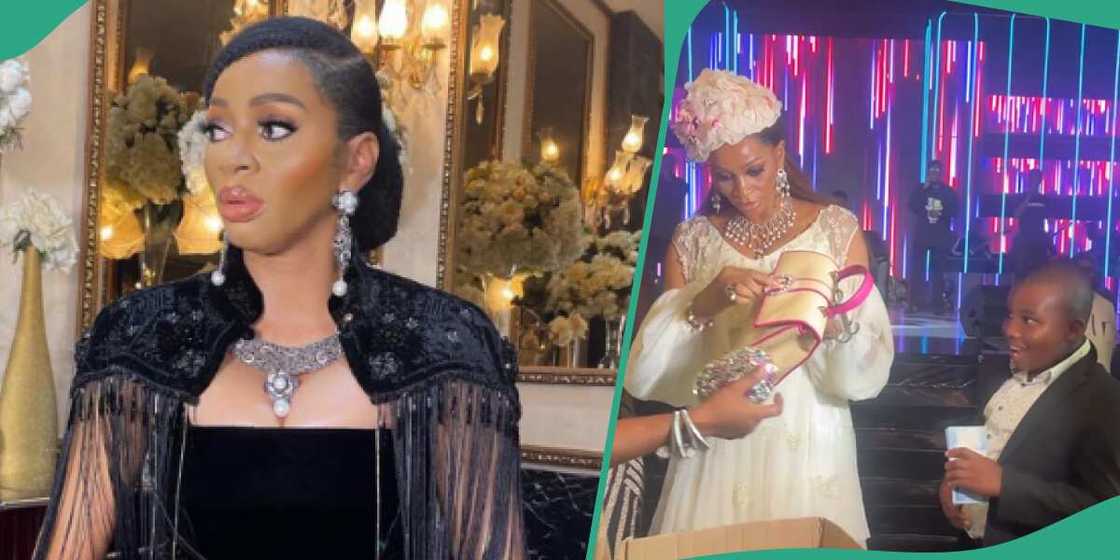 Shade Okoya gives boy bundle of cash at party in viral video. Shade Okoya gives boy bundle of cash at party in viral video.