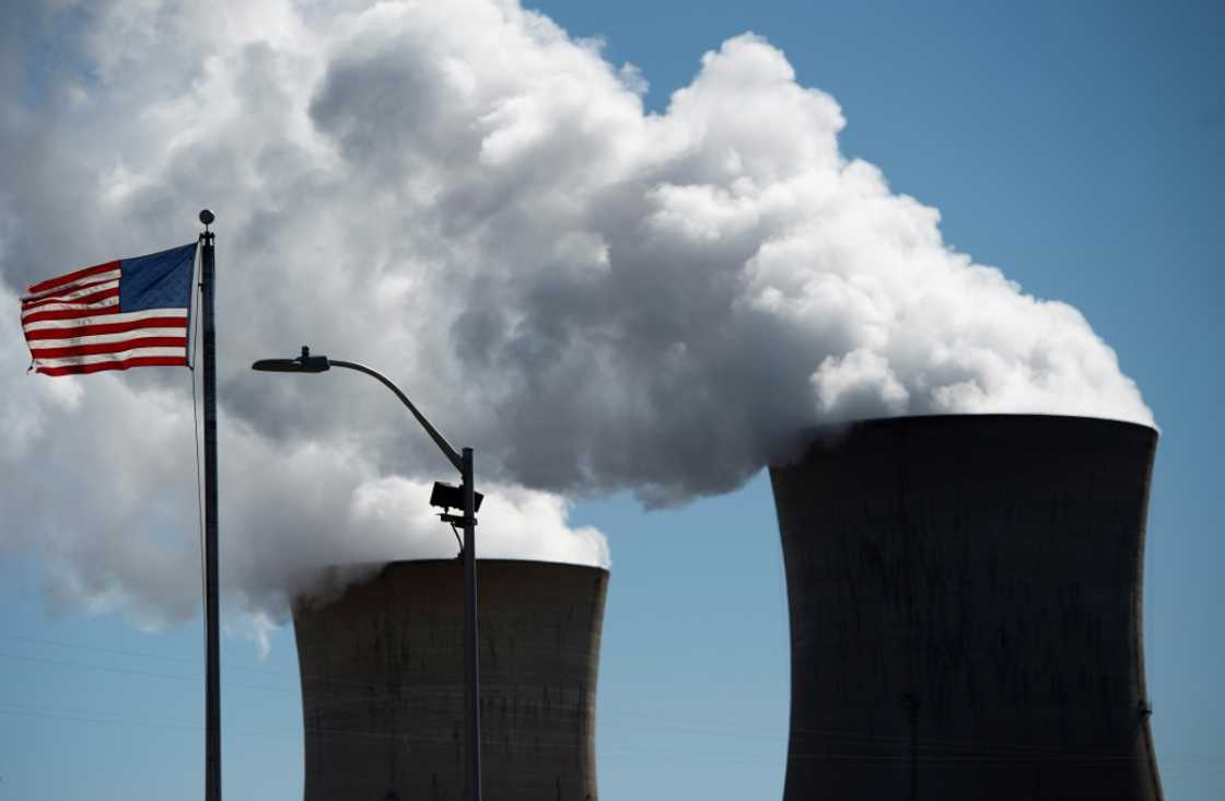 Steam rises out of the nuclear plant on Three Mile Island, with the operational plant run by Exelon Generation, in Middletown, Pennsylvania