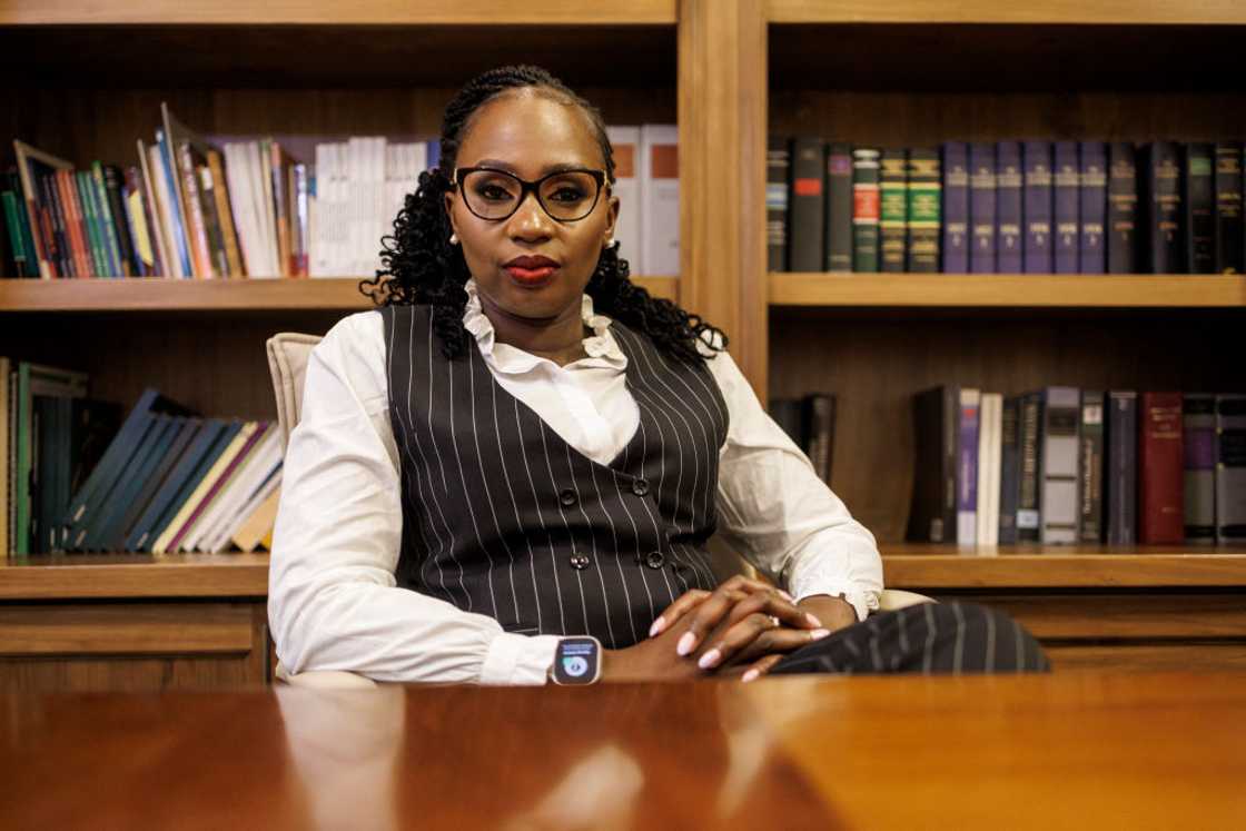 Lady sits in a law office. Lady sits in a law office.