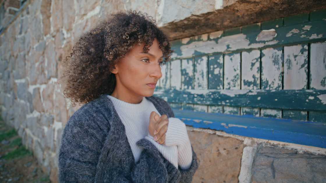 A sad shivering woman