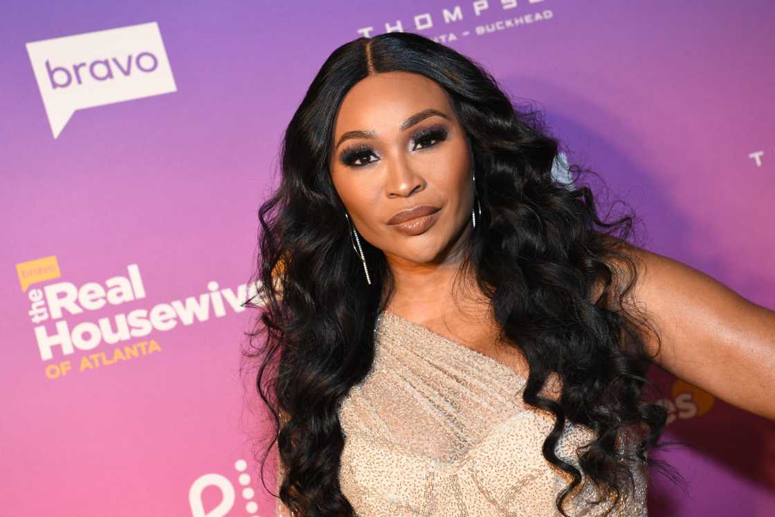 Cynthia Bailey poses in a champaign coloured dress at Tesserae at Thompson Buckhead Cynthia Bailey poses in a champaign coloured dress at Tesserae at Thompson Buckhead