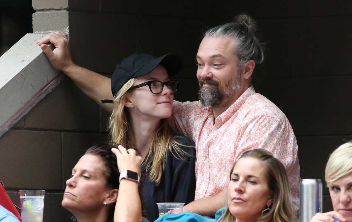 Betty Gilpin and Cosmo Pfeil pictured conversing suring the 2019 US Open Betty Gilpin and Cosmo Pfeil pictured conversing suring the 2019 US Open
