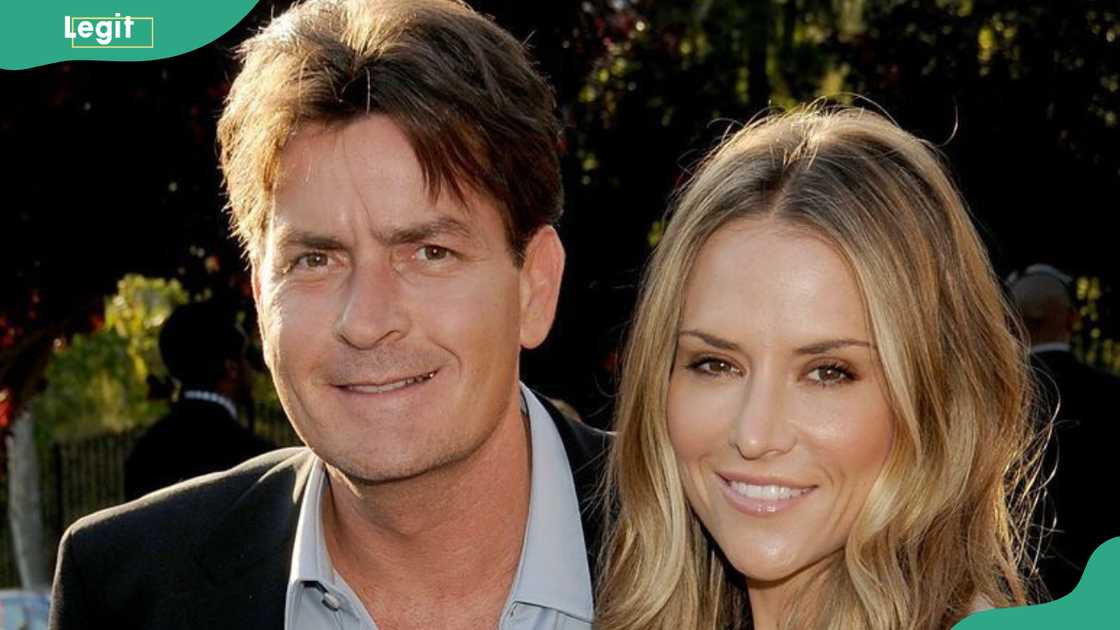 Charlie Sheen and Brooke Mueller smile in a photo