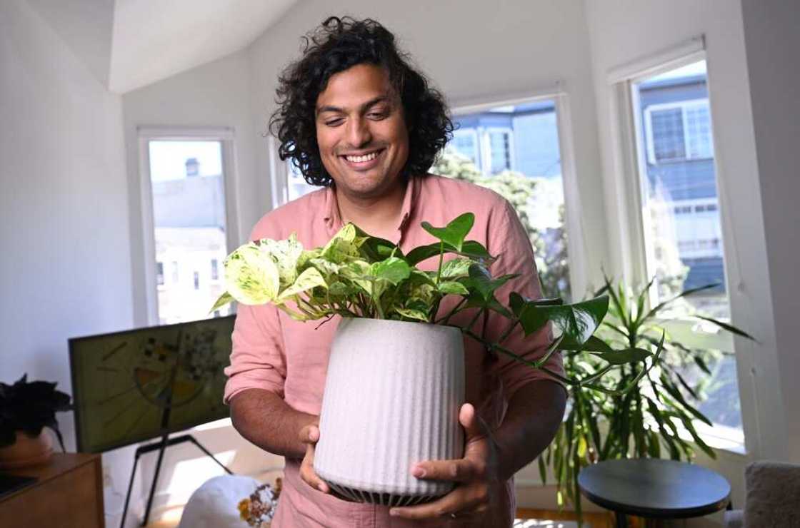 Vincent Nallatamby holds his Neo Px plant at his home in San Francisco, California Vincent Nallatamby holds his Neo Px plant at his home in San Francisco, California