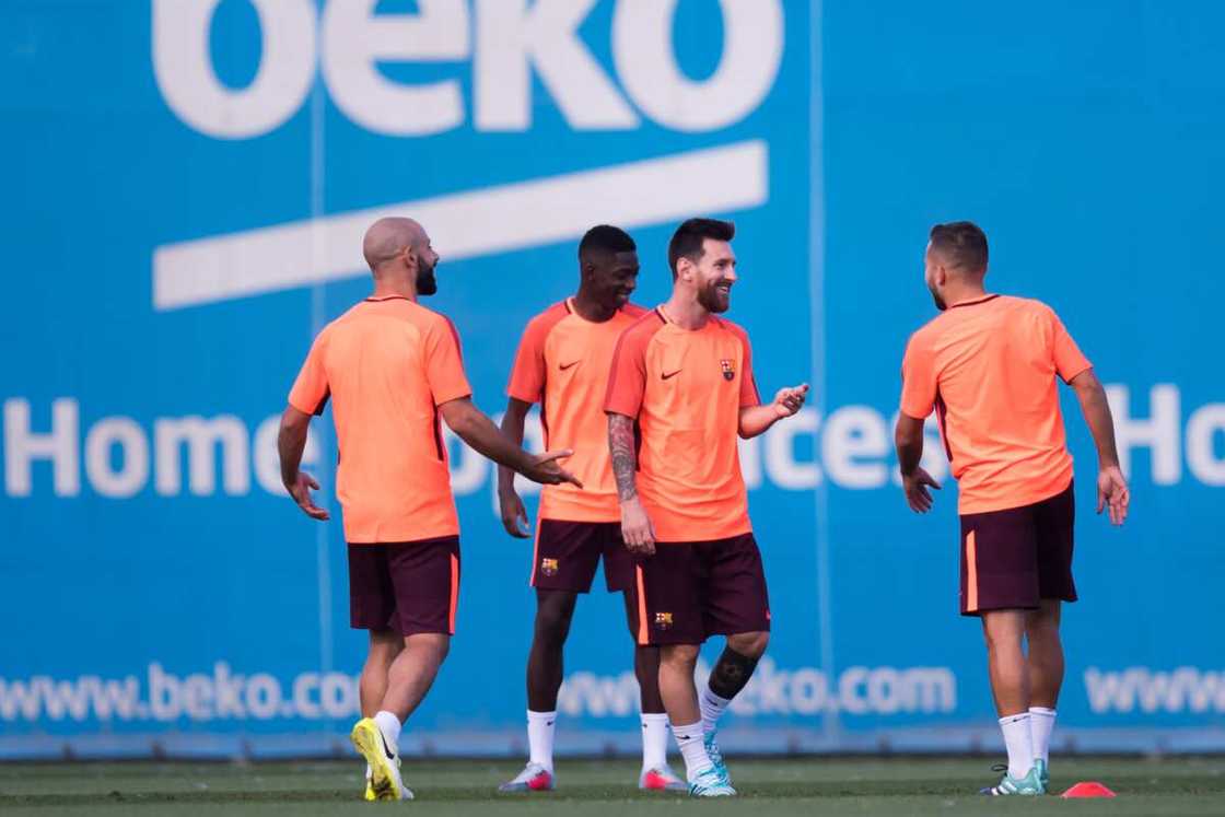 Lionel Messi and teammates Lionel Messi and teammates