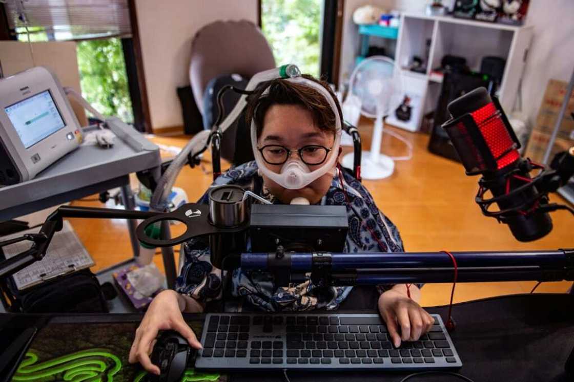 Last year, Shunya Hatakeyama and a friend designed a custom controller he could use with his chin Last year, Shunya Hatakeyama and a friend designed a custom controller he could use with his chin
