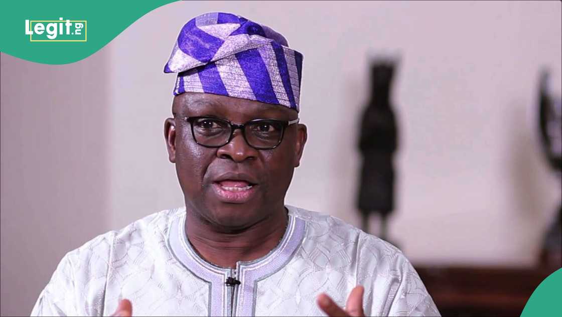 Fayose eats amala with construction workers to celebrate court victory