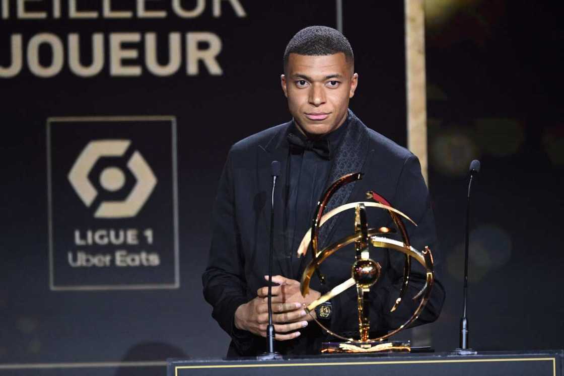 Paris Saint-Germain's French forward Kylian Mbappe delivers a speech after receiving the Best Ligue 1 Player award during the 31th edition of the UNFP trophy ceremony Paris Saint-Germain's French forward Kylian Mbappe delivers a speech after receiving the Best Ligue 1 Player award during the 31th edition of the UNFP trophy ceremony