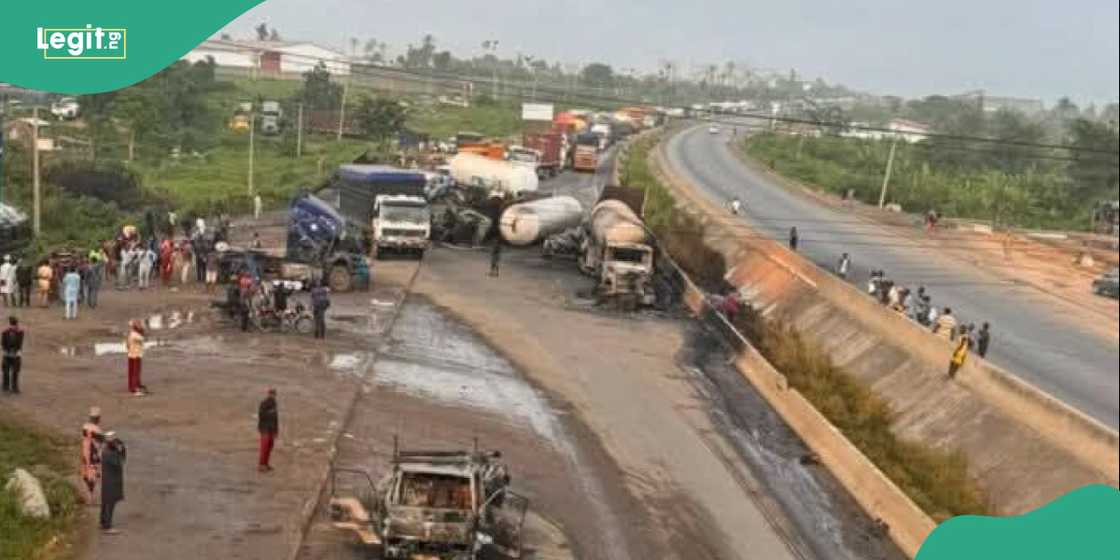 Burnt tankers and damaged vehicles litter a section of the Lagos-Ibadan Expressway after the accident.
