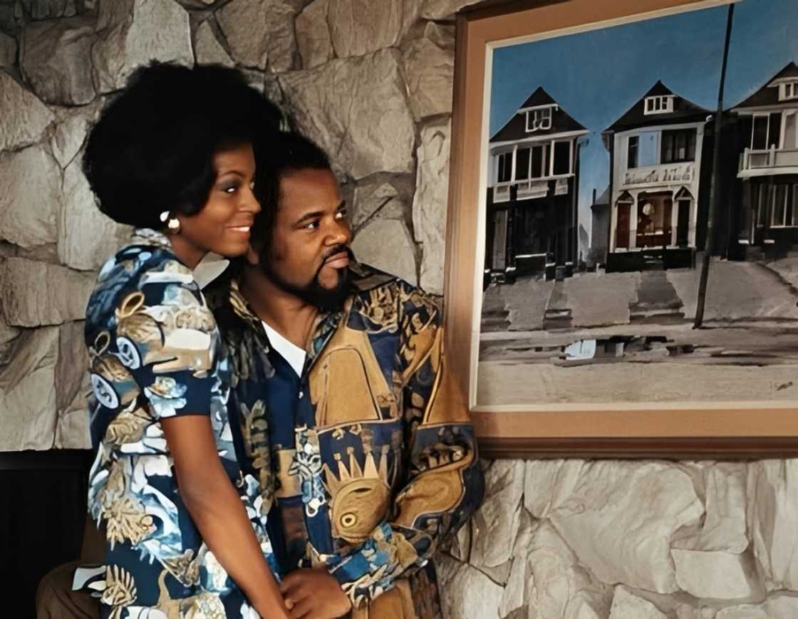 Diana Ross and Berry Gordy pose standing Diana Ross and Berry Gordy pose standing