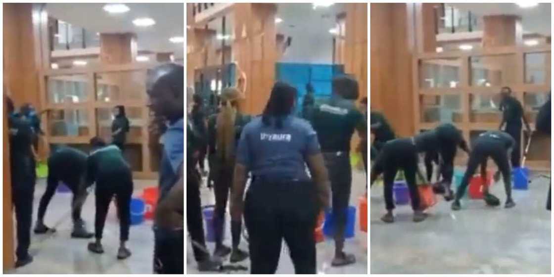 Video of cleaners scooping water from floor following leaking national assembly roof sparks reactions Video of cleaners scooping water from floor following leaking national assembly roof sparks reactions