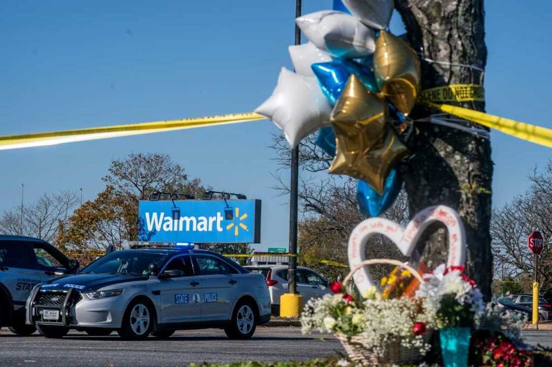 A memorial at the site of a fatal shooting in a Walmart in Chesapeake, Virginia -- the assault came two days before Thanksgiving, the quintessential American family holiday A memorial at the site of a fatal shooting in a Walmart in Chesapeake, Virginia -- the assault came two days before Thanksgiving, the quintessential American family holiday