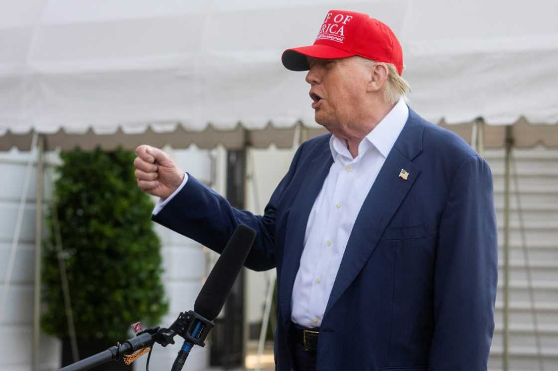 US President Donald Trump talks to members of the press as he departs from the South Lawn of the White House in Washington, DC on July 1, 2025. Trump is heading to Florida to visit "Alligator Alcatraz" immigrant detention center. US President Donald Trump talks to members of the press as he departs from the South Lawn of the White House in Washington, DC on July 1, 2025. Trump is heading to Florida to visit "Alligator Alcatraz" immigrant detention center.