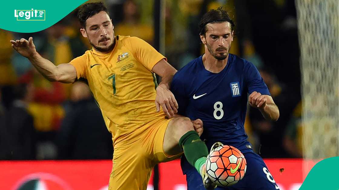 Australia's Mathew Leckie in action with Greece's Marios Oikonomou during their international friendly football match in Sydney in June 2016. Photo by SAEED KHAN Australia's Mathew Leckie in action with Greece's Marios Oikonomou during their international friendly football match in Sydney in June 2016. Photo by SAEED KHAN