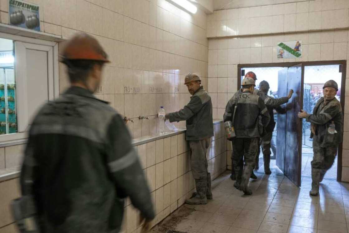 Phones must be surrendered at the start of shifts and staff learn only of the latest developments -- and the safety of friends and family -- when they emerge back into the sunlight six hours later Phones must be surrendered at the start of shifts and staff learn only of the latest developments -- and the safety of friends and family -- when they emerge back into the sunlight six hours later