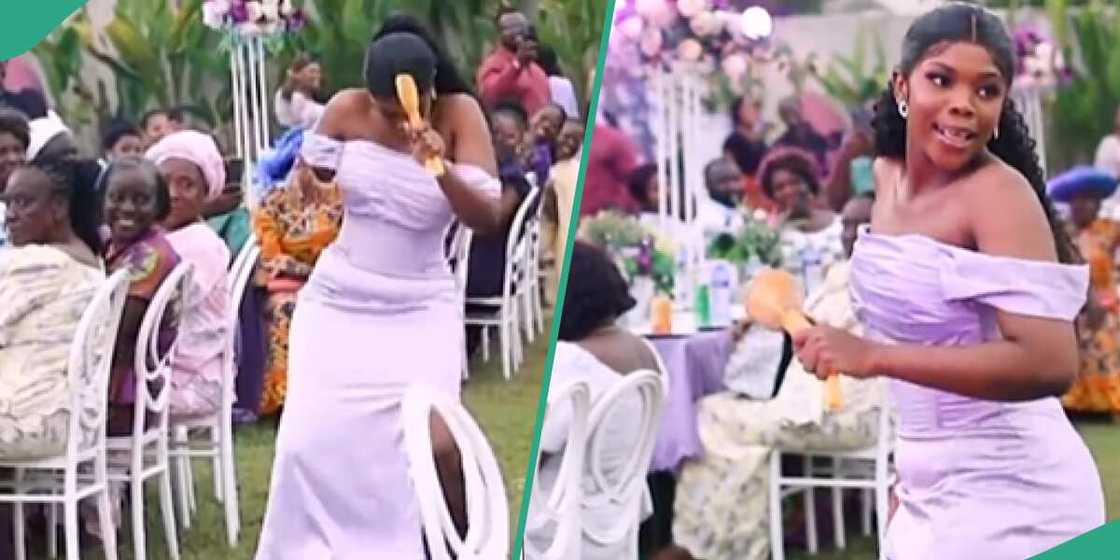 A bridesmaid wears a purple dress at a wedding A bridesmaid wears a purple dress at a wedding