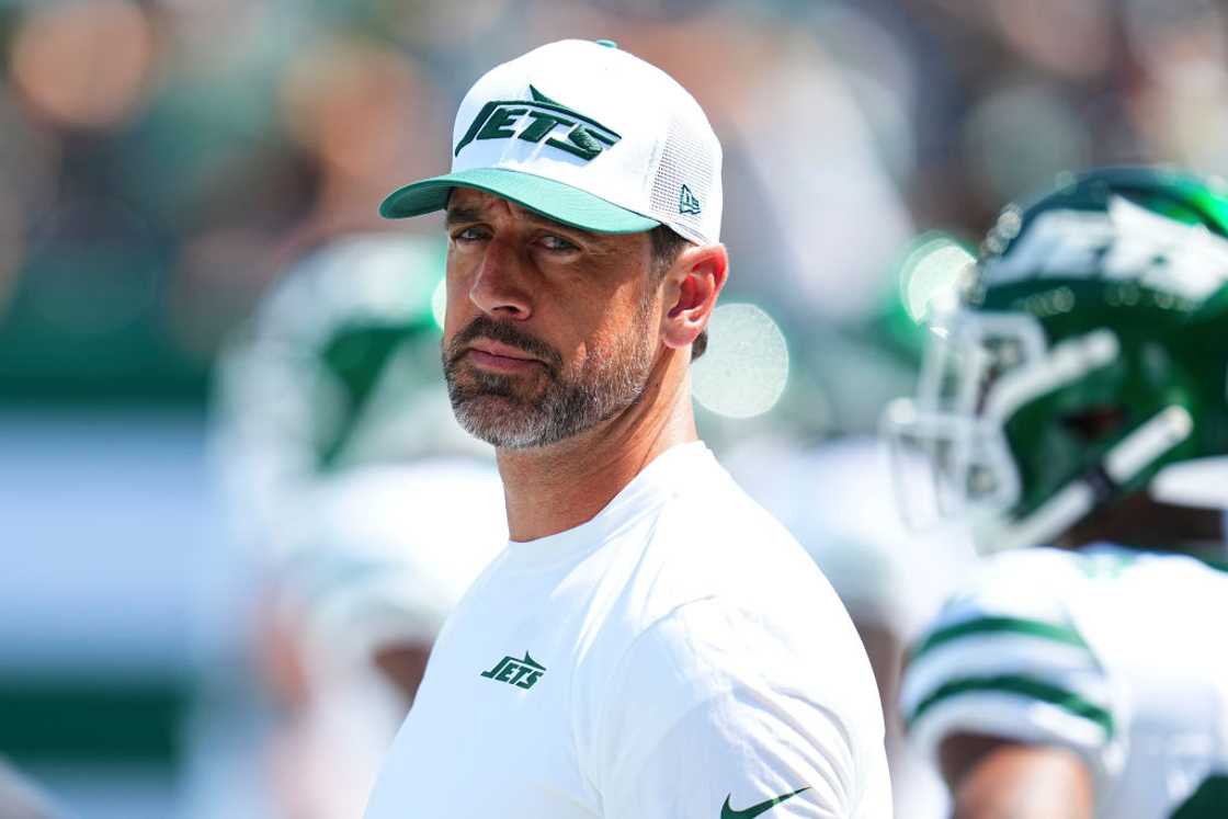 Aaron Rodgers looks on before an NFL game