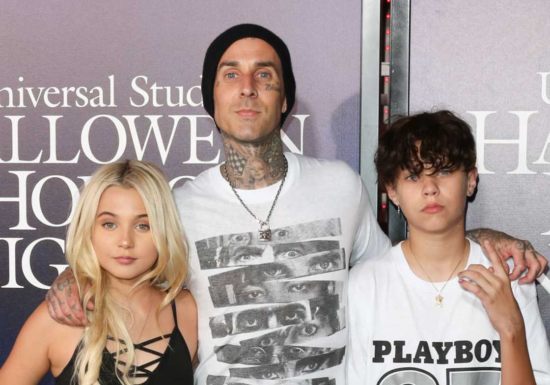 Alabama Barker, Travis Barker and Landon Barker at Universal Studios CityWalk Cinemas in Universal City, California Alabama Barker, Travis Barker and Landon Barker at Universal Studios CityWalk Cinemas in Universal City, California
