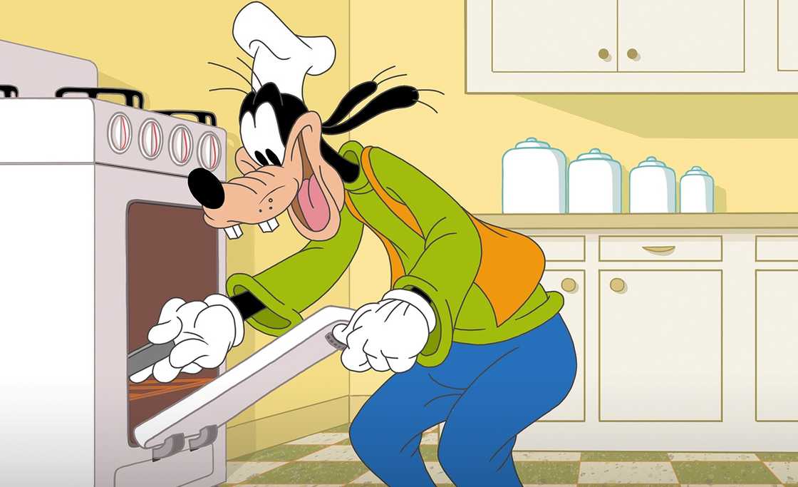 An illustration of Goofy using an oven. An illustration of Goofy using an oven.