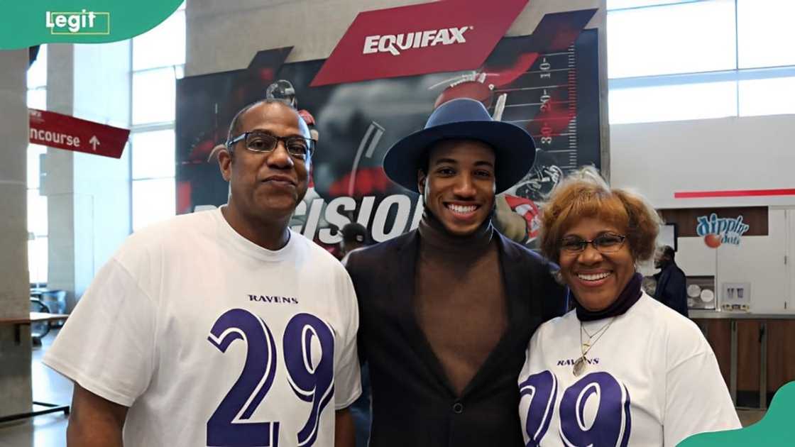 NFL player Marlon Humphrey with his parents, Bobby (L) and Barbara (R)