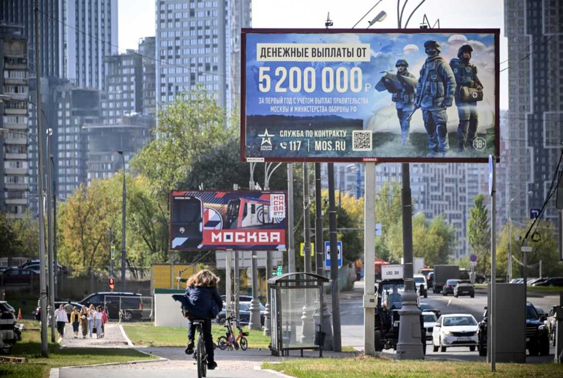 Moscow has the resources for a long fight, economists say Moscow has the resources for a long fight, economists say