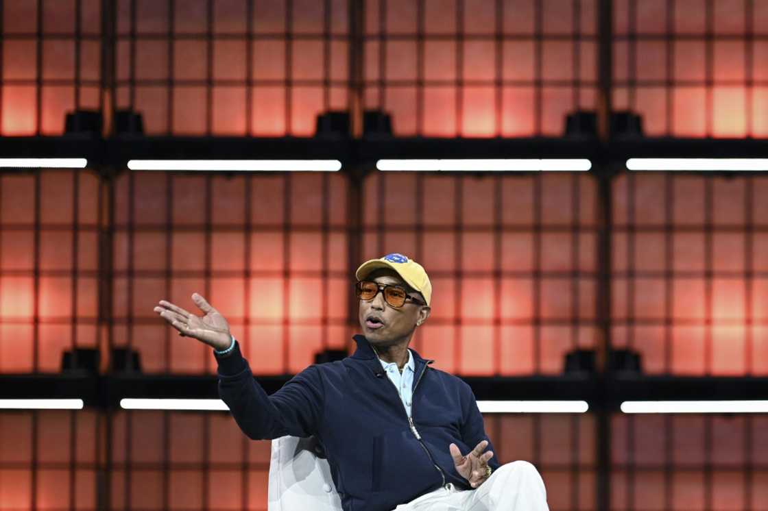 US singer Pharrell Williams brought star power to the event's opening on Monday night US singer Pharrell Williams brought star power to the event's opening on Monday night