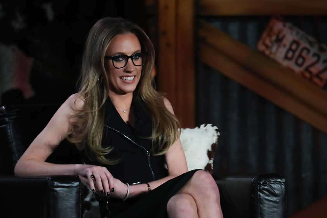 Kat Timpf seated while speaking during Fox News Channel's "Gutfeld!"