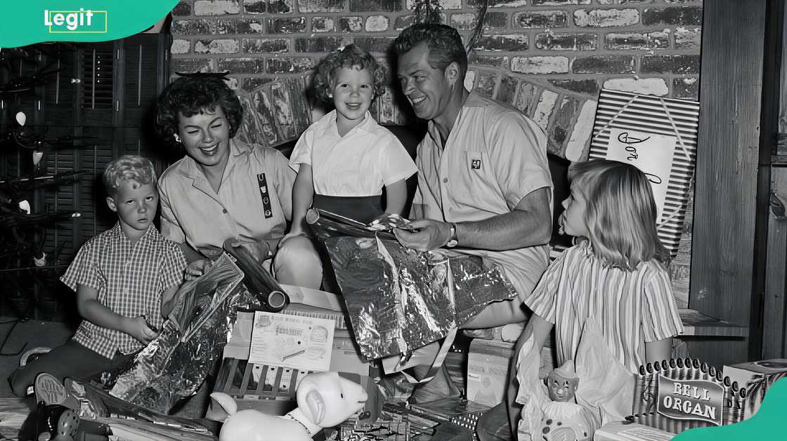 Juanita Katt's family sharing an affectionate moment Juanita Katt's family sharing an affectionate moment