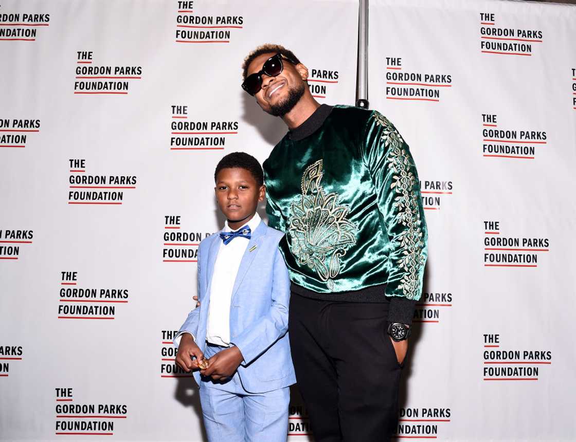 Usher Raymond IV and his son Naviyd Ely Raymond in New York City.