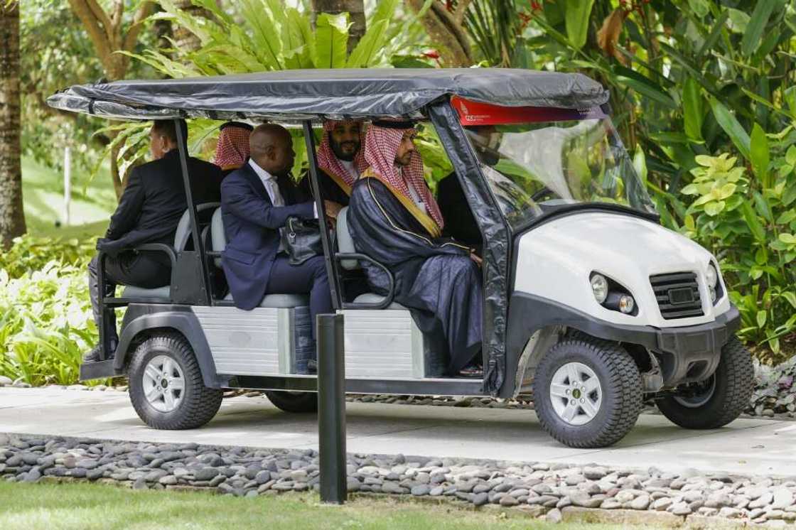 Saudi Arabia's Crown Prince Mohammed bin Salman rides a buggy during the G20 leaders' summit in Bali