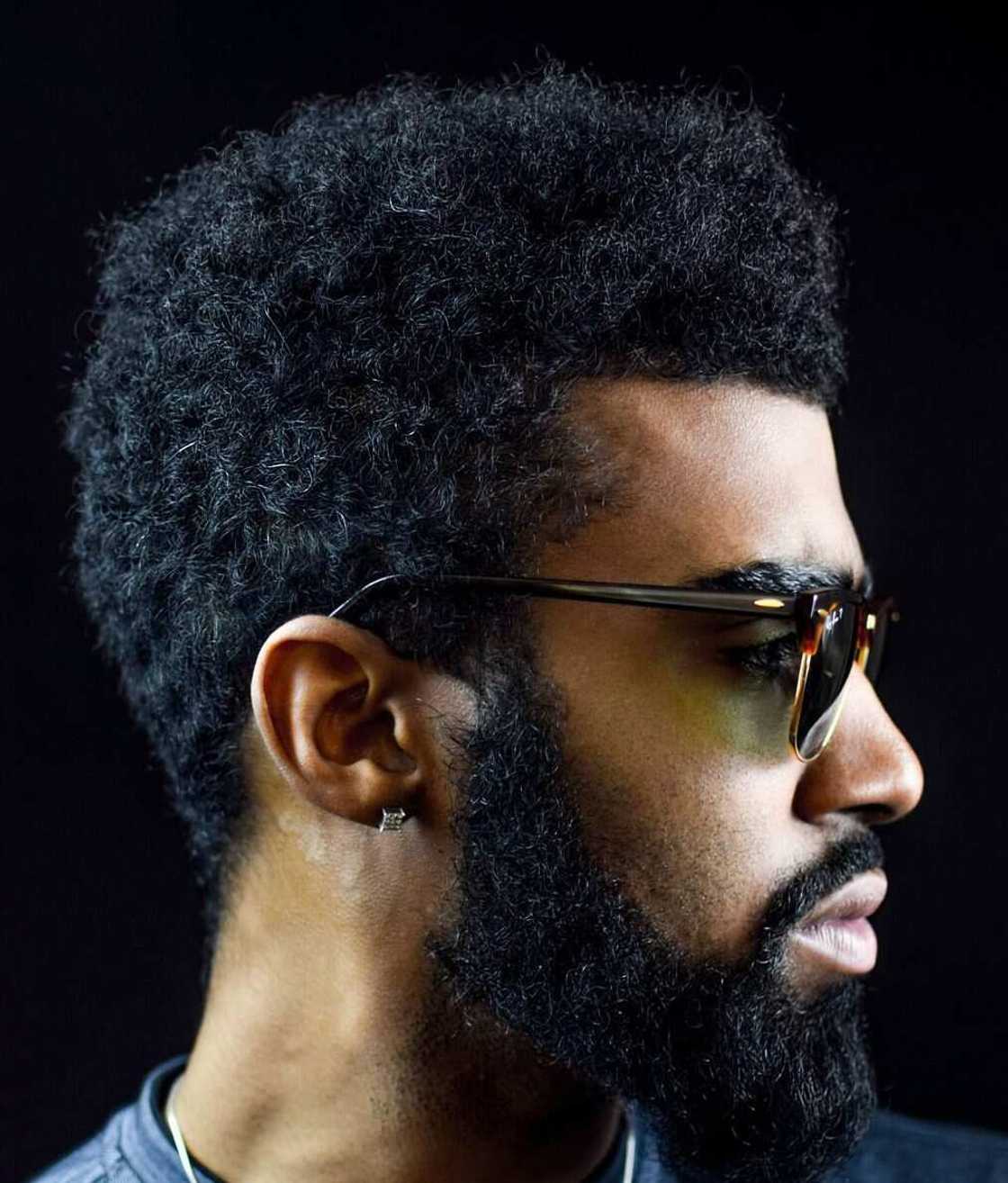 Thick beard and tight hair are trendy among Africans Thick beard and tight hair are trendy among Africans