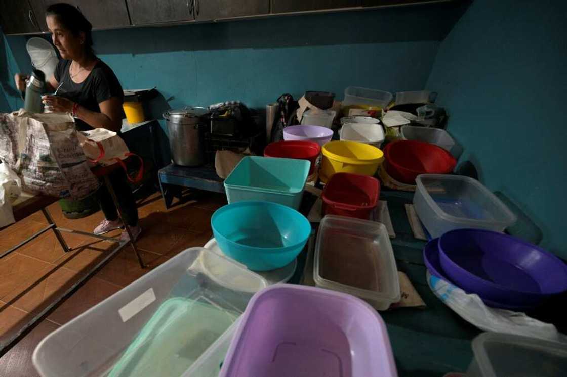 Plastic containers pile up, awaiting a free meal