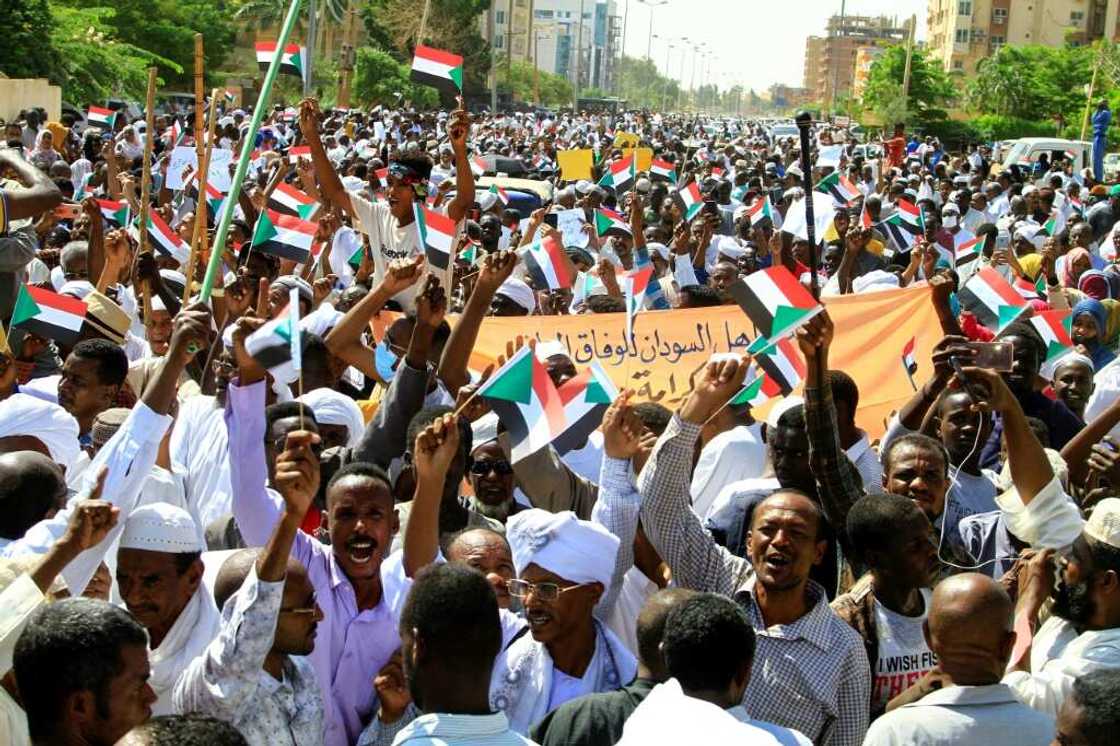 The crowd that gathered Saturday in front of the headquarters of the UN mission in Sudan chanted pro-Bashir slogans and burned photos of UN envoy Volker Perthes The crowd that gathered Saturday in front of the headquarters of the UN mission in Sudan chanted pro-Bashir slogans and burned photos of UN envoy Volker Perthes