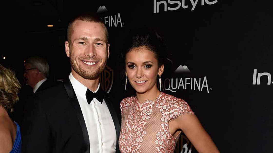 Actors Glen Powell (L) and Nina Dobrev (R) attend a party in 2016 Actors Glen Powell (L) and Nina Dobrev (R) attend a party in 2016