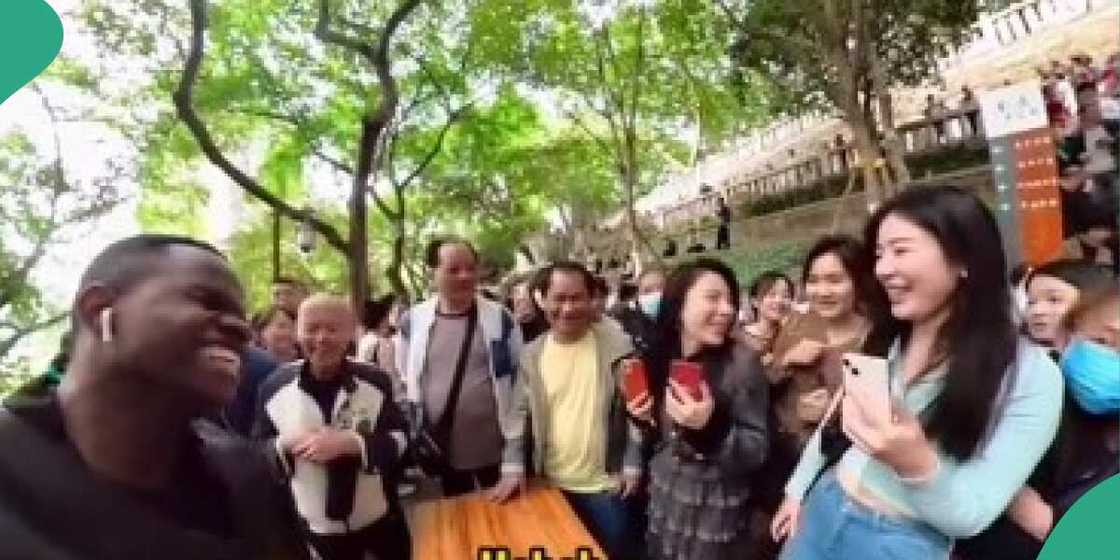 Black man catches Chinese women's eyes at their marriage market Black man catches Chinese women's eyes at their marriage market