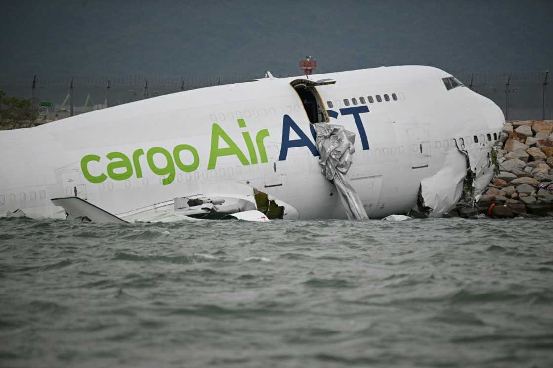 A cargo plane veered off the runway in Hong Kong, killing two people A cargo plane veered off the runway in Hong Kong, killing two people