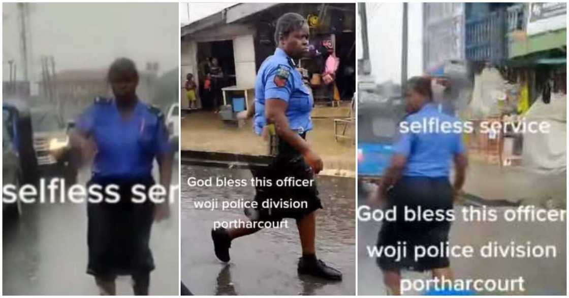Female police woman, Port Harcourt, controlling traffic Female police woman, Port Harcourt, controlling traffic