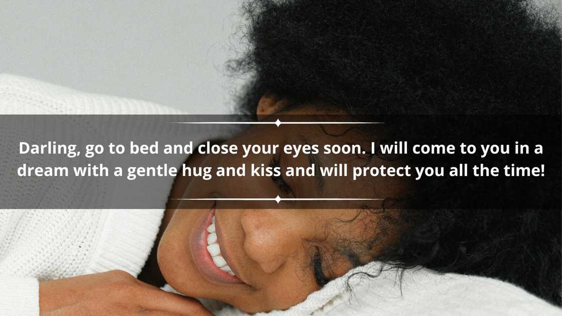 A woman sleeping in bed smiling A woman sleeping in bed smiling
