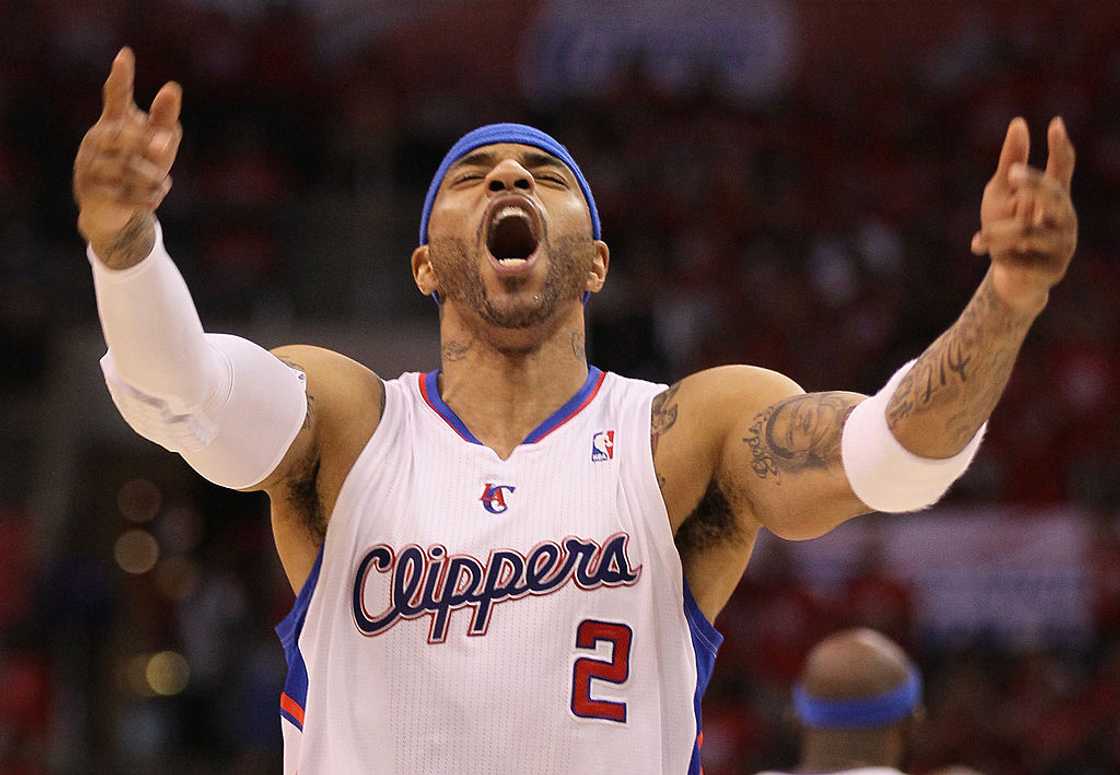 Kenyon Martin reacts after dunking the ball in the second quarter against the Memphis Grizzlies in 2012