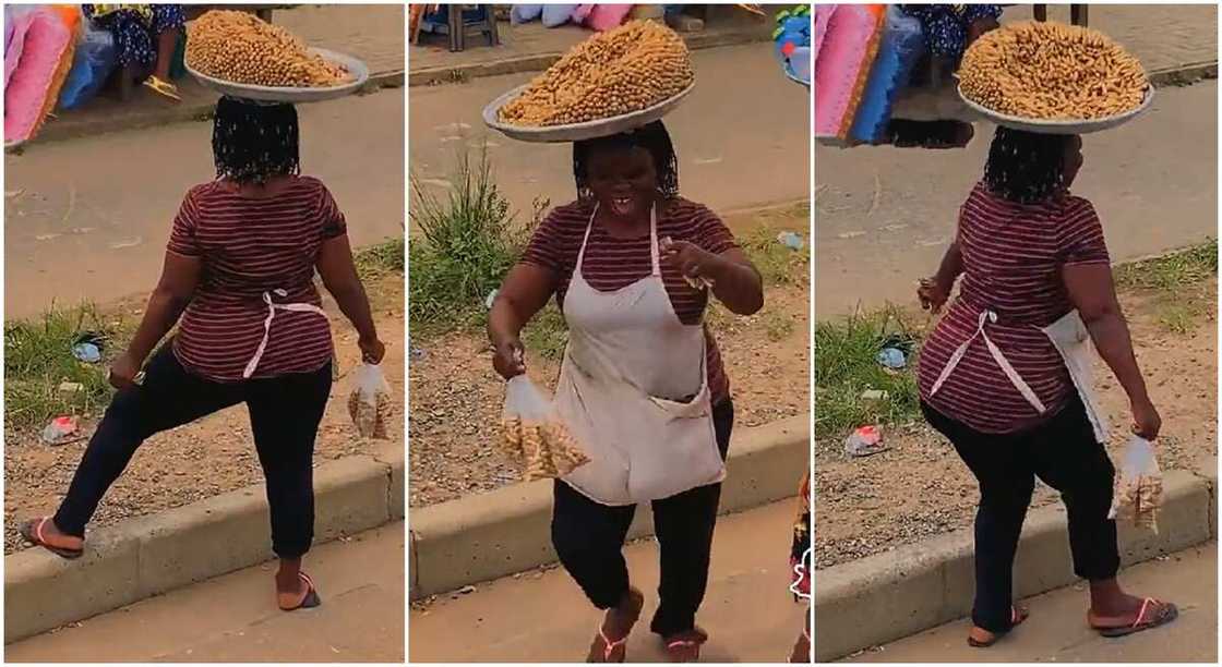 Photos of a lady dancing with a tray of groundnut on her head. Photos of a lady dancing with a tray of groundnut on her head.