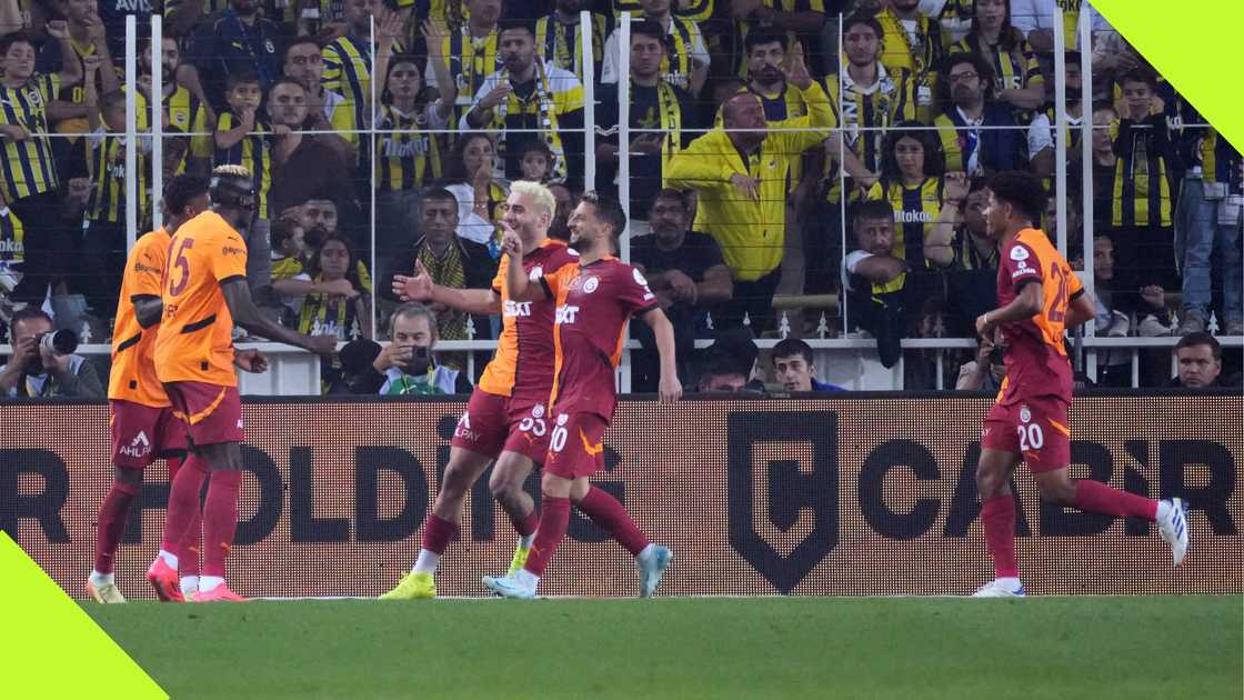 Victor Osimhen celebrates with Galatasaray teammates after Dries Mertens' goal.