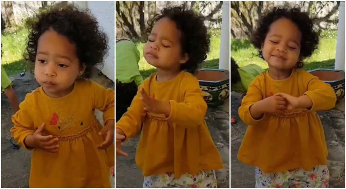 Photos of a little girl dancing to One Love by Bob Marley. Photos of a little girl dancing to One Love by Bob Marley.