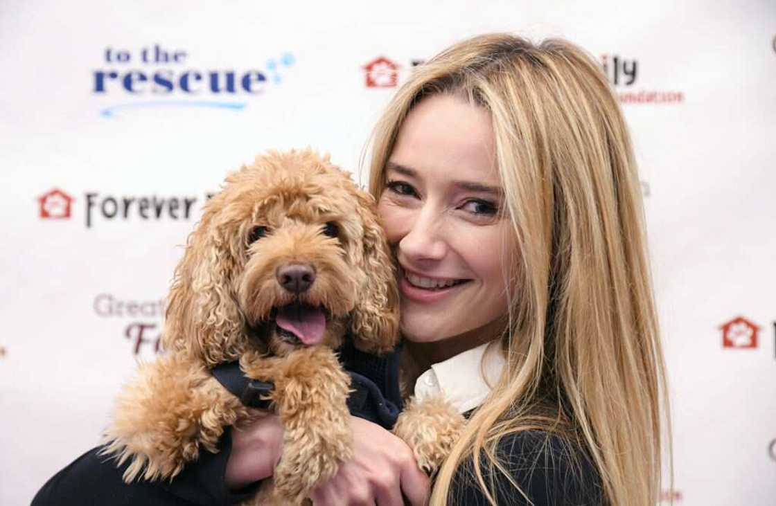 Amy Shiels holding her dog Sonny Jim Hill