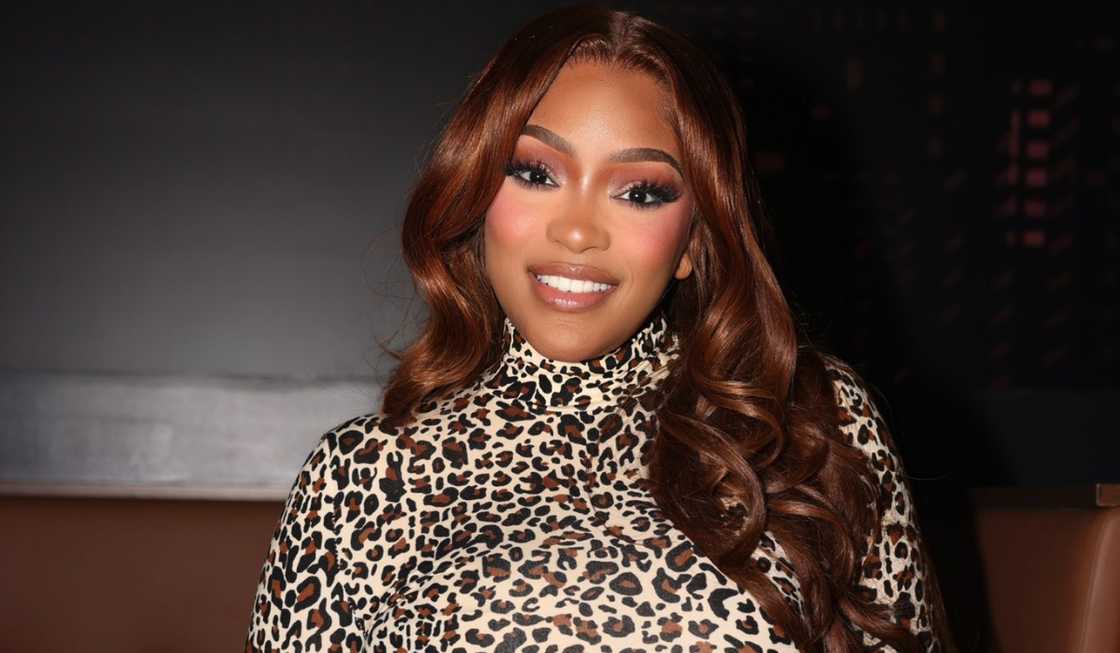 Drew Sidora posing for a RHOA promotional shoot Drew Sidora posing for a RHOA promotional shoot