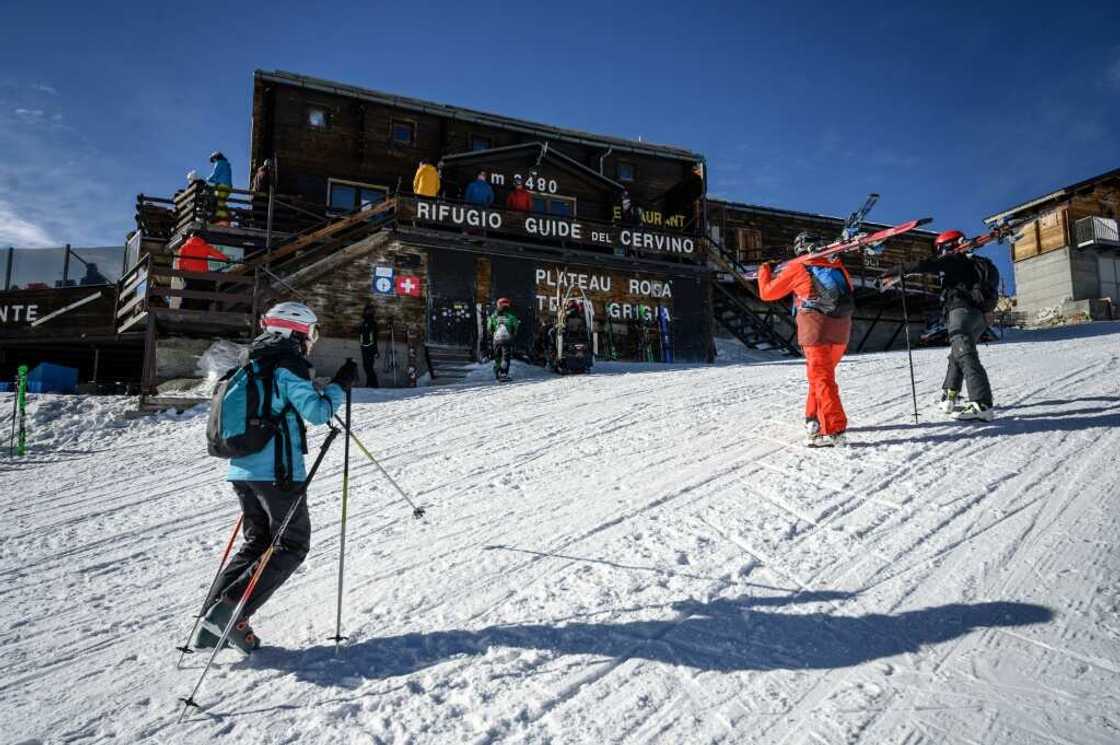 Two-thirds of the mountain lodge, including most of the beds and the restaurant, is now technically perched in southern Switzerland