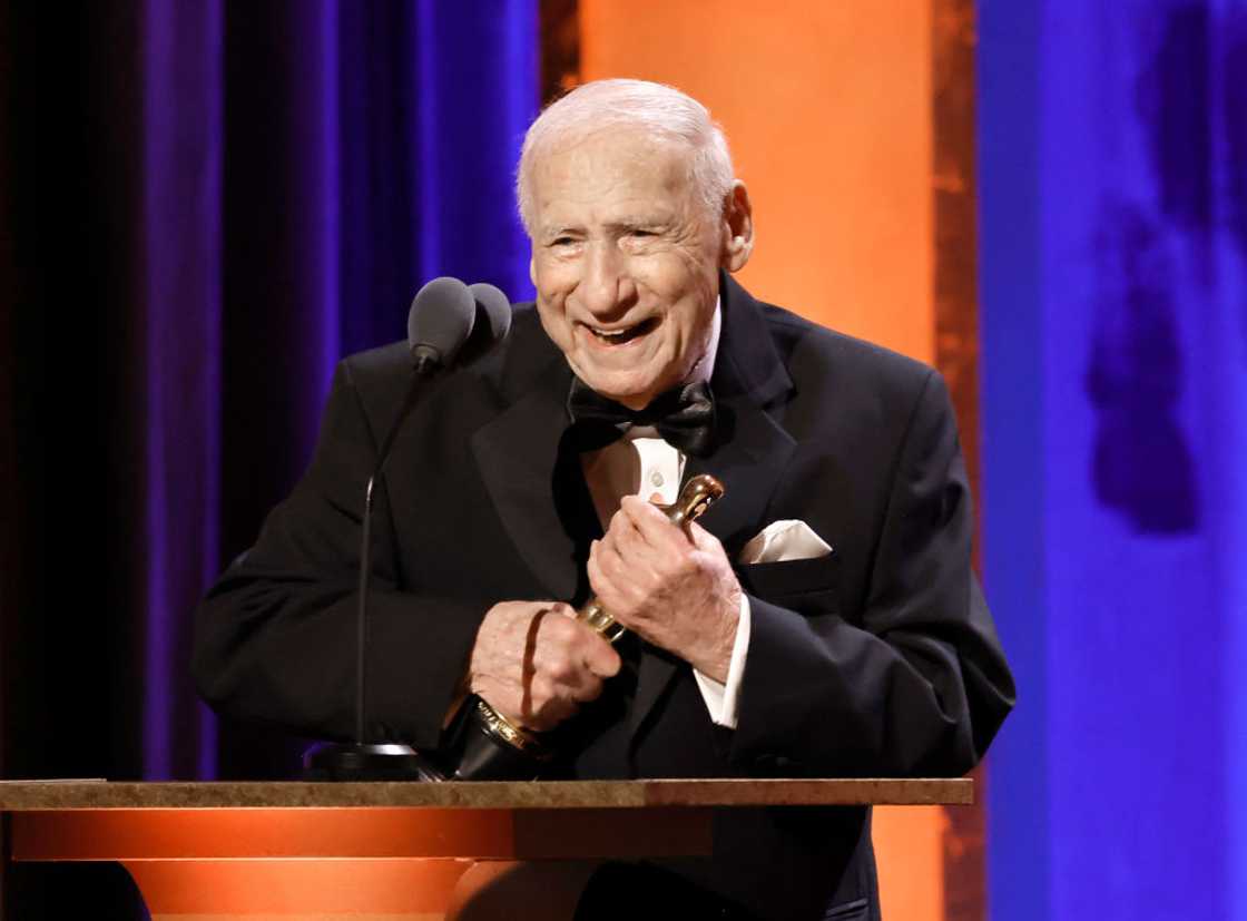 Mel Brooks onstage making his acceptance speech for an honorary Oscar