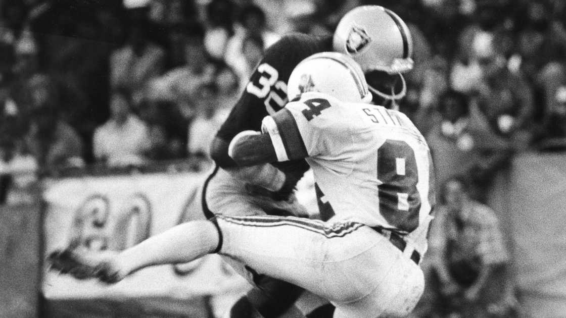 Oakland Raiders Jack Tatum (back) hits New England Patriots Darryl Stingley (front) in August 1978.