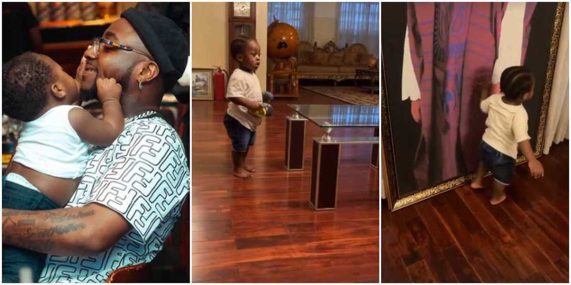 Heir Apparent: Davido Proudly Shows Off Ifeanyi as He Plays and Admires Photos in His Grandfather’s Mansion Heir Apparent: Davido Proudly Shows Off Ifeanyi as He Plays and Admires Photos in His Grandfather’s Mansion